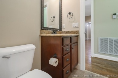 One of a kind custom, ranch-style home with courtyard entry and on Anderson Creek Golf Club in North Carolina - for sale on GolfHomes.com, golf home, golf lot