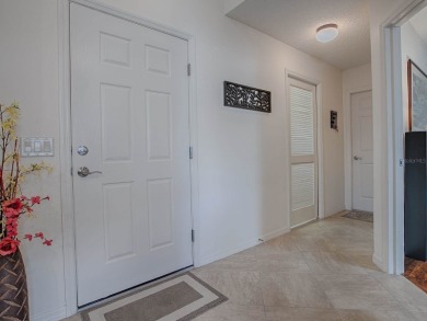 Charming 3-Bedroom BONITA model Courtyard Villa in The Village on Truman Executive Golf Course in Florida - for sale on GolfHomes.com, golf home, golf lot
