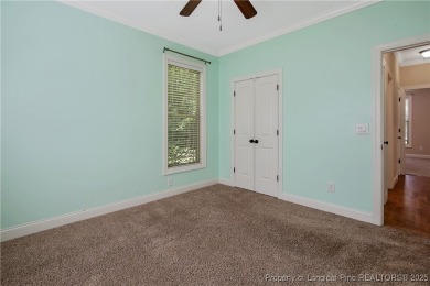 One of a kind custom, ranch-style home with courtyard entry and on Anderson Creek Golf Club in North Carolina - for sale on GolfHomes.com, golf home, golf lot
