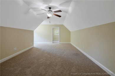 One of a kind custom, ranch-style home with courtyard entry and on Anderson Creek Golf Club in North Carolina - for sale on GolfHomes.com, golf home, golf lot