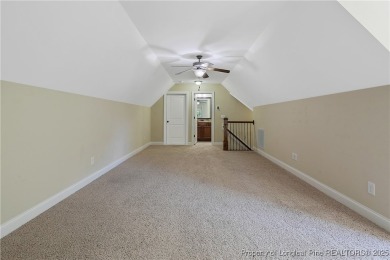 One of a kind custom, ranch-style home with courtyard entry and on Anderson Creek Golf Club in North Carolina - for sale on GolfHomes.com, golf home, golf lot