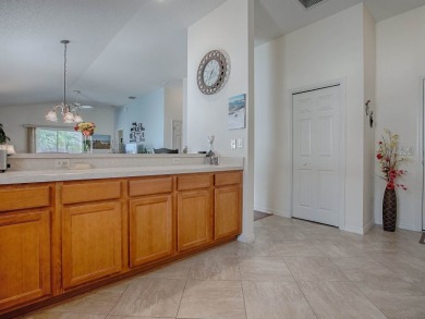 Charming 3-Bedroom BONITA model Courtyard Villa in The Village on Truman Executive Golf Course in Florida - for sale on GolfHomes.com, golf home, golf lot