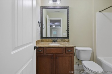 One of a kind custom, ranch-style home with courtyard entry and on Anderson Creek Golf Club in North Carolina - for sale on GolfHomes.com, golf home, golf lot