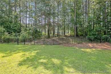 One of a kind custom, ranch-style home with courtyard entry and on Anderson Creek Golf Club in North Carolina - for sale on GolfHomes.com, golf home, golf lot