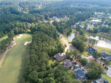 One of a kind custom, ranch-style home with courtyard entry and on Anderson Creek Golf Club in North Carolina - for sale on GolfHomes.com, golf home, golf lot