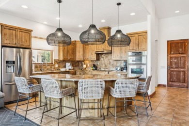 Tucked inside the exclusive gated enclave of Tuweap Point, this on Entrada at Snow Canyon in Utah - for sale on GolfHomes.com, golf home, golf lot