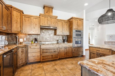 Tucked inside the exclusive gated enclave of Tuweap Point, this on Entrada at Snow Canyon in Utah - for sale on GolfHomes.com, golf home, golf lot