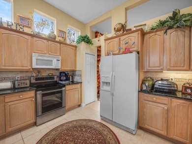 This beautifully appointed 2-bedroom plus den, 2.5-bath on PGA Golf Club in PGA Village in Florida - for sale on GolfHomes.com, golf home, golf lot