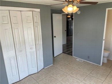 Welcome home to this 2 bed 1.5 bath beauty. Upgrades include on Barefoot Bay Golf Course in Florida - for sale on GolfHomes.com, golf home, golf lot