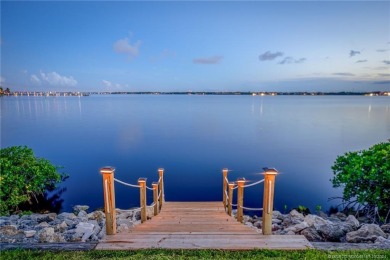 As soon as you enter this home, you are welcomed by the on Santa Lucia River Club in Florida - for sale on GolfHomes.com, golf home, golf lot