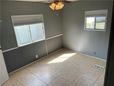Welcome home to this 2 bed 1.5 bath beauty. Upgrades include on Barefoot Bay Golf Course in Florida - for sale on GolfHomes.com, golf home, golf lot