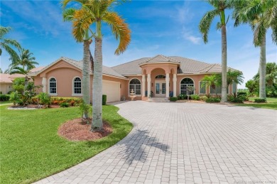 As soon as you enter this home, you are welcomed by the on Santa Lucia River Club in Florida - for sale on GolfHomes.com, golf home, golf lot