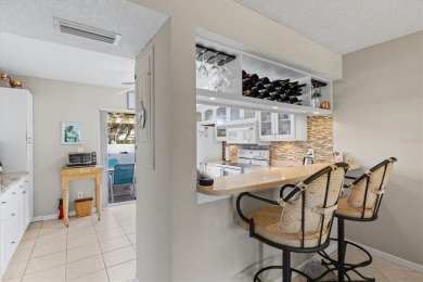 This charming 2-bedroom, 2-bathroom villa is ideally located in on Plantation Golf and Country Club in Florida - for sale on GolfHomes.com, golf home, golf lot