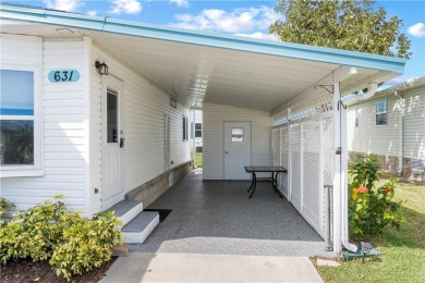 Welcome home to this 2 bed 1.5 bath beauty. Upgrades include on Barefoot Bay Golf Course in Florida - for sale on GolfHomes.com, golf home, golf lot