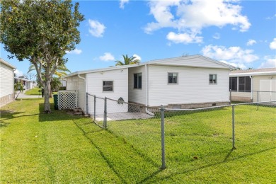 Welcome home to this 2 bed 1.5 bath beauty. Upgrades include on Barefoot Bay Golf Course in Florida - for sale on GolfHomes.com, golf home, golf lot
