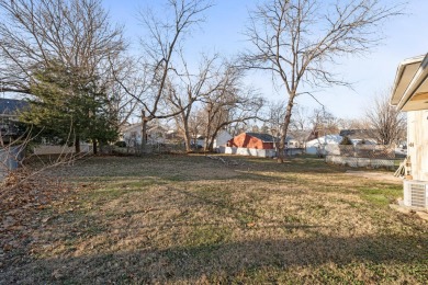 Welcome to 2427 E 30th Street - a stunningly renovated on Grand View Golf Course in Iowa - for sale on GolfHomes.com, golf home, golf lot