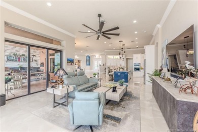 As soon as you enter this home, you are welcomed by the on Santa Lucia River Club in Florida - for sale on GolfHomes.com, golf home, golf lot