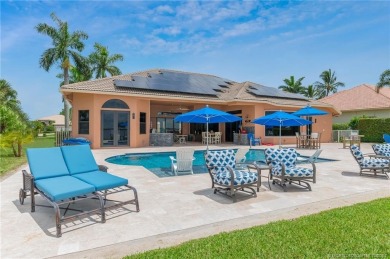 As soon as you enter this home, you are welcomed by the on Santa Lucia River Club in Florida - for sale on GolfHomes.com, golf home, golf lot