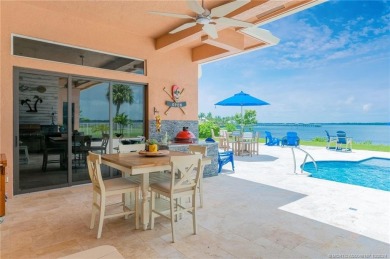 As soon as you enter this home, you are welcomed by the on Santa Lucia River Club in Florida - for sale on GolfHomes.com, golf home, golf lot