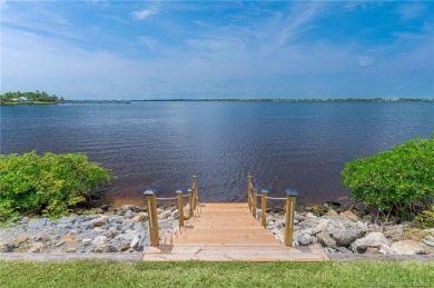 As soon as you enter this home, you are welcomed by the on Santa Lucia River Club in Florida - for sale on GolfHomes.com, golf home, golf lot