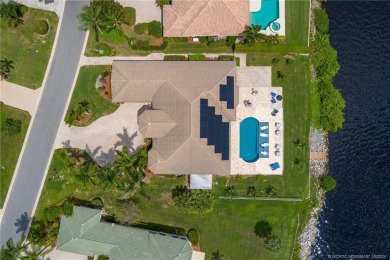 As soon as you enter this home, you are welcomed by the on Santa Lucia River Club in Florida - for sale on GolfHomes.com, golf home, golf lot