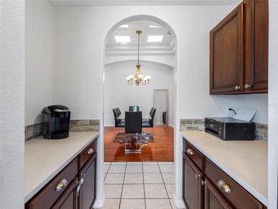 This updated waterfront pool home delivers an outstanding living on Westchase Golf Club in Florida - for sale on GolfHomes.com, golf home, golf lot