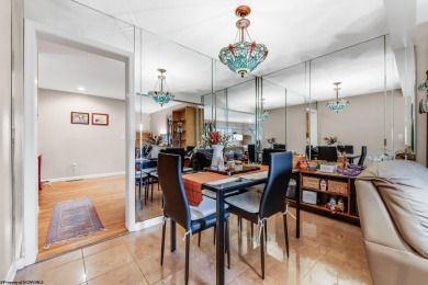 This lovely end unit townhome offers the perfect blend of on Lakeview Golf Resort and Spa - Lakeview in West Virginia - for sale on GolfHomes.com, golf home, golf lot