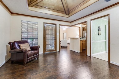 Absolutely impeccable and brimming with curb appeal, this on Duck Creek Golf Club in Texas - for sale on GolfHomes.com, golf home, golf lot