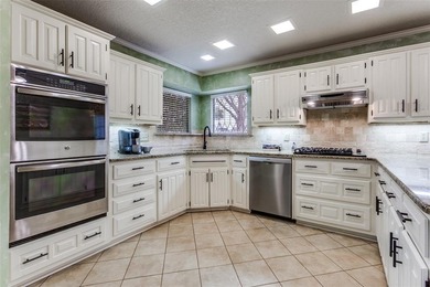 Absolutely impeccable and brimming with curb appeal, this on Duck Creek Golf Club in Texas - for sale on GolfHomes.com, golf home, golf lot