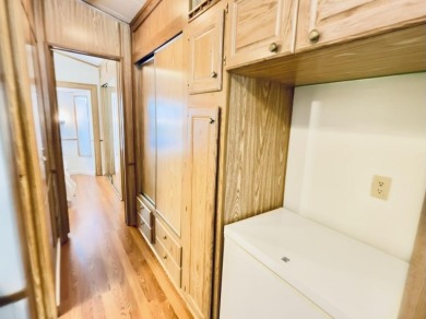 Welcome to your peaceful getaway! Located in The Holiday Out RV on Lake Tansi Village Country Club in Tennessee - for sale on GolfHomes.com, golf home, golf lot