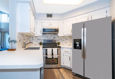 Welcome to this beautifully updated 2-bedroom, 2-bathroom on Ventura Country Club in Florida - for sale on GolfHomes.com, golf home, golf lot