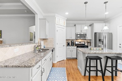 This luxurious home located in Brunswick Forest checks all of on Cape Fear National At Brunswick Forest in North Carolina - for sale on GolfHomes.com, golf home, golf lot