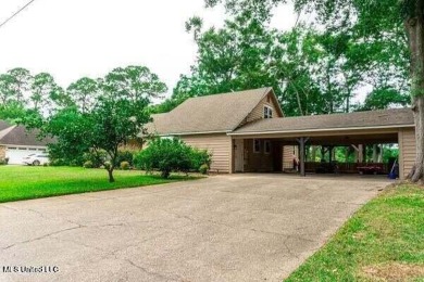 BEAUTIFUL HOME ON THE GOLF COURSE AND JUST MINUTES TO THE BEACH on Pascagoula Country Club in Mississippi - for sale on GolfHomes.com, golf home, golf lot