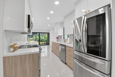 Stunning, 3 Bedroom, 2.5 Bath 1st floor corner Willow Wood on Boca West Golf and Country Club in Florida - for sale on GolfHomes.com, golf home, golf lot