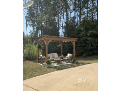 Super cute home perched at the end of a quiet and lovely cu de on Lake Forest Yacht and Country Club in Alabama - for sale on GolfHomes.com, golf home, golf lot