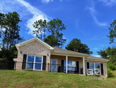 Super cute home perched at the end of a quiet and lovely cu de on Lake Forest Yacht and Country Club in Alabama - for sale on GolfHomes.com, golf home, golf lot