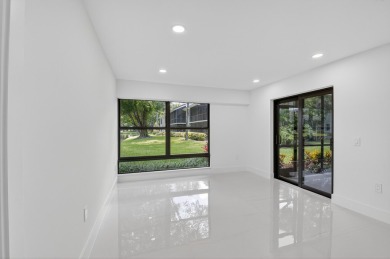 Stunning, 3 Bedroom, 2.5 Bath 1st floor corner Willow Wood on Boca West Golf and Country Club in Florida - for sale on GolfHomes.com, golf home, golf lot