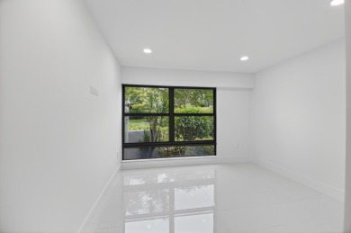 Stunning, 3 Bedroom, 2.5 Bath 1st floor corner Willow Wood on Boca West Golf and Country Club in Florida - for sale on GolfHomes.com, golf home, golf lot