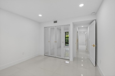 Stunning, 3 Bedroom, 2.5 Bath 1st floor corner Willow Wood on Boca West Golf and Country Club in Florida - for sale on GolfHomes.com, golf home, golf lot