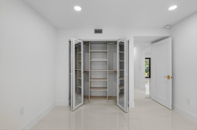 Stunning, 3 Bedroom, 2.5 Bath 1st floor corner Willow Wood on Boca West Golf and Country Club in Florida - for sale on GolfHomes.com, golf home, golf lot