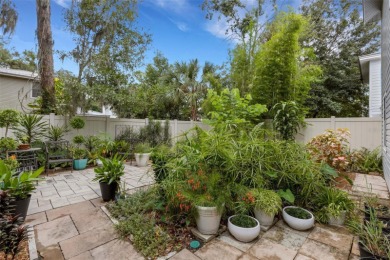 Welcome to Raintree Village--a charming Lakeland neighborhood on Cleveland Heights Golf Course in Florida - for sale on GolfHomes.com, golf home, golf lot