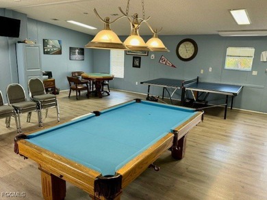 This charming single family home boasts 2 bedrooms and 2 on Riverbend Golf and Country Club in Florida - for sale on GolfHomes.com, golf home, golf lot