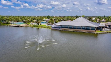 Under contract-accepting backup offers. The curb appeal of this on Maple Leaf Golf and Country Club in Florida - for sale on GolfHomes.com, golf home, golf lot