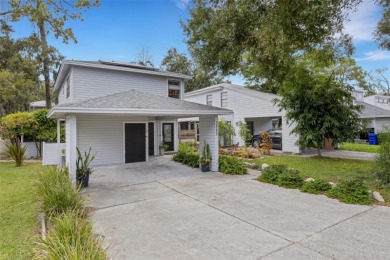 Welcome to Raintree Village--a charming Lakeland neighborhood on Cleveland Heights Golf Course in Florida - for sale on GolfHomes.com, golf home, golf lot