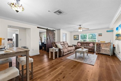 Discover this beautifully updated main floor condo 2-bedroom on Bobby Jones Golf Club in Florida - for sale on GolfHomes.com, golf home, golf lot
