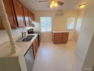 Ready to enjoy Lake Life?  Just move into this 2nd floor condo on Lake Saint Louis Par 3 in Missouri - for sale on GolfHomes.com, golf home, golf lot