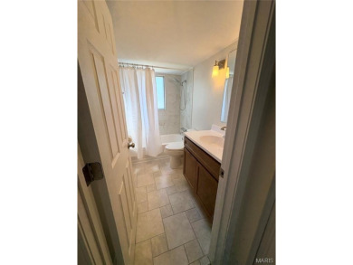 Ready to enjoy Lake Life?  Just move into this 2nd floor condo on Lake Saint Louis Par 3 in Missouri - for sale on GolfHomes.com, golf home, golf lot