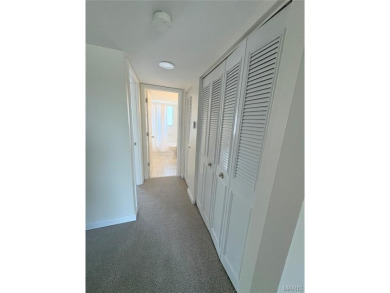 Ready to enjoy Lake Life?  Just move into this 2nd floor condo on Lake Saint Louis Par 3 in Missouri - for sale on GolfHomes.com, golf home, golf lot