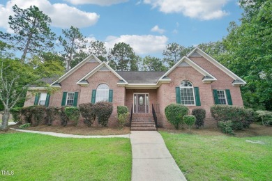 EXQUISITE 3 bed, 2.5 bath brick ranch style home settled on a on Gates Four Golf and Country Club in North Carolina - for sale on GolfHomes.com, golf home, golf lot