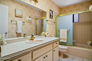 This spacious Southwest-style custom pool home is perfect for on Cerbat Cliffs Golf Course in Arizona - for sale on GolfHomes.com, golf home, golf lot